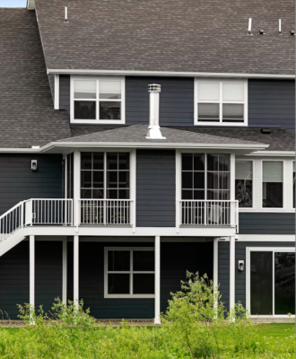 blue house with white trim and modern siding